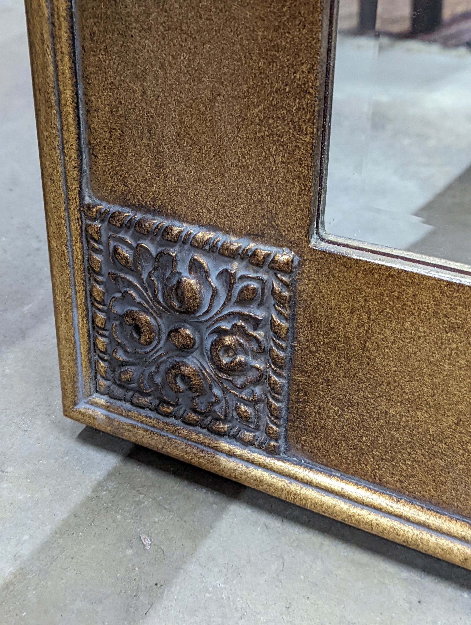 A modern gilt framed painted rectangular overmantel mirror, width 99cm, height 125cm